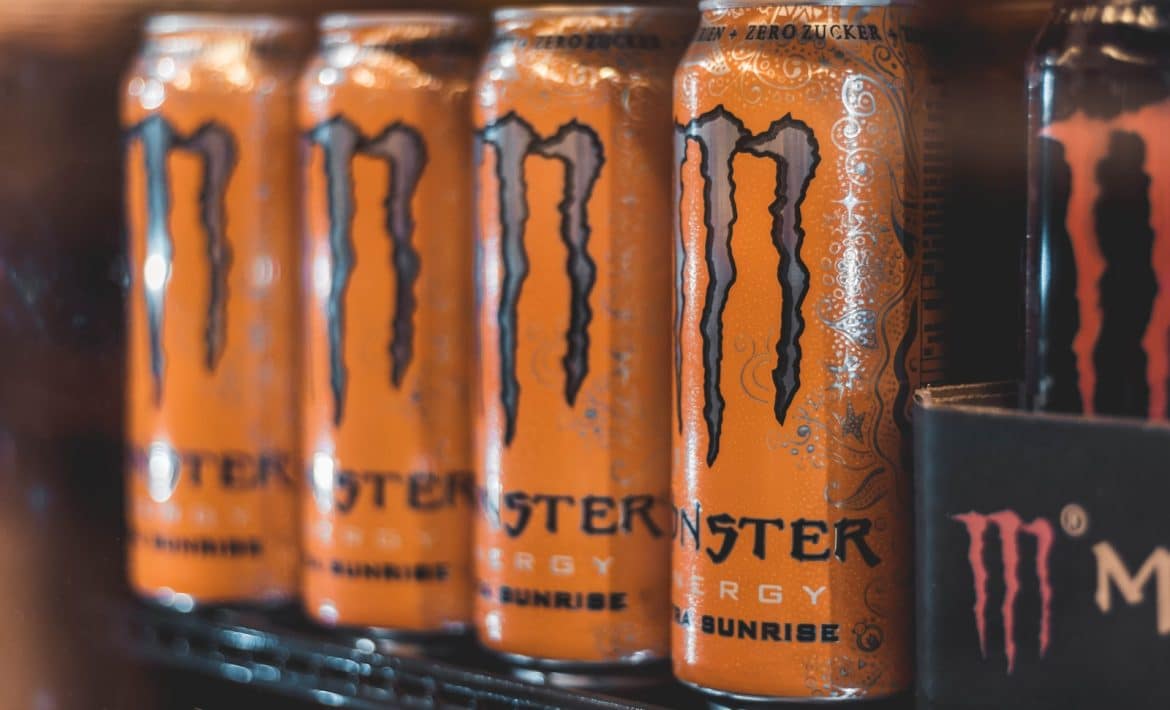 five Monster Energy cans